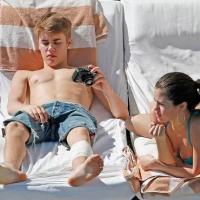 Justin Bieber e Selena Gomez namorando e tirando fotos
